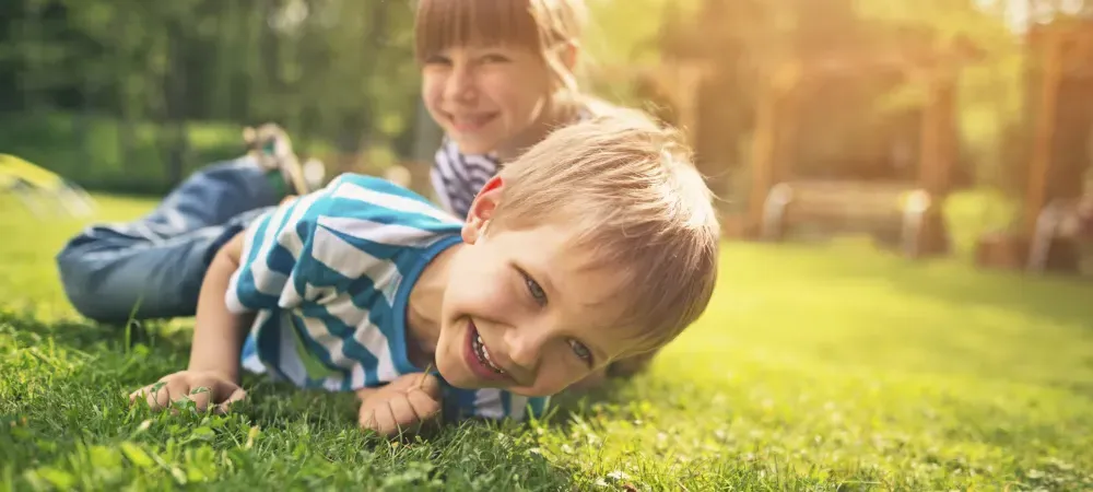 kid in lawn